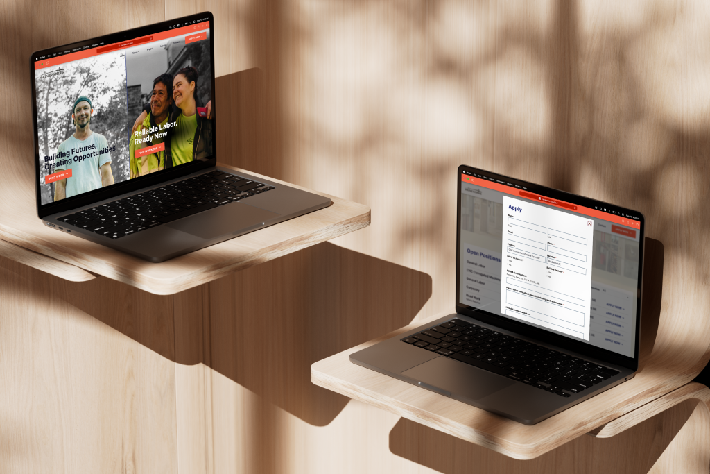 two laptops facing each other, displaying different pages on the MaineWorks website