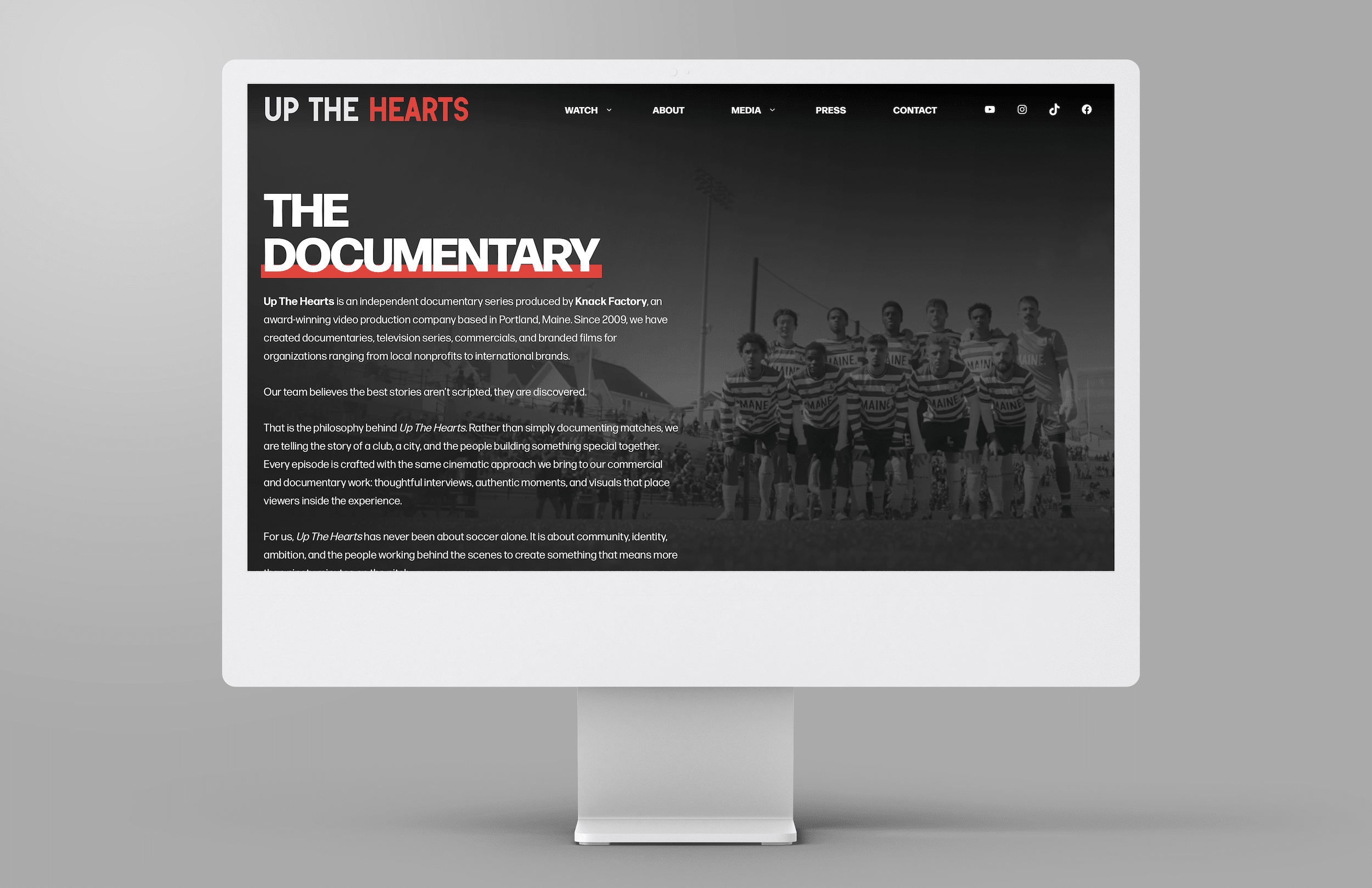 Website homepage for Up The Hearts documentary series with a soccer team background and navigation links