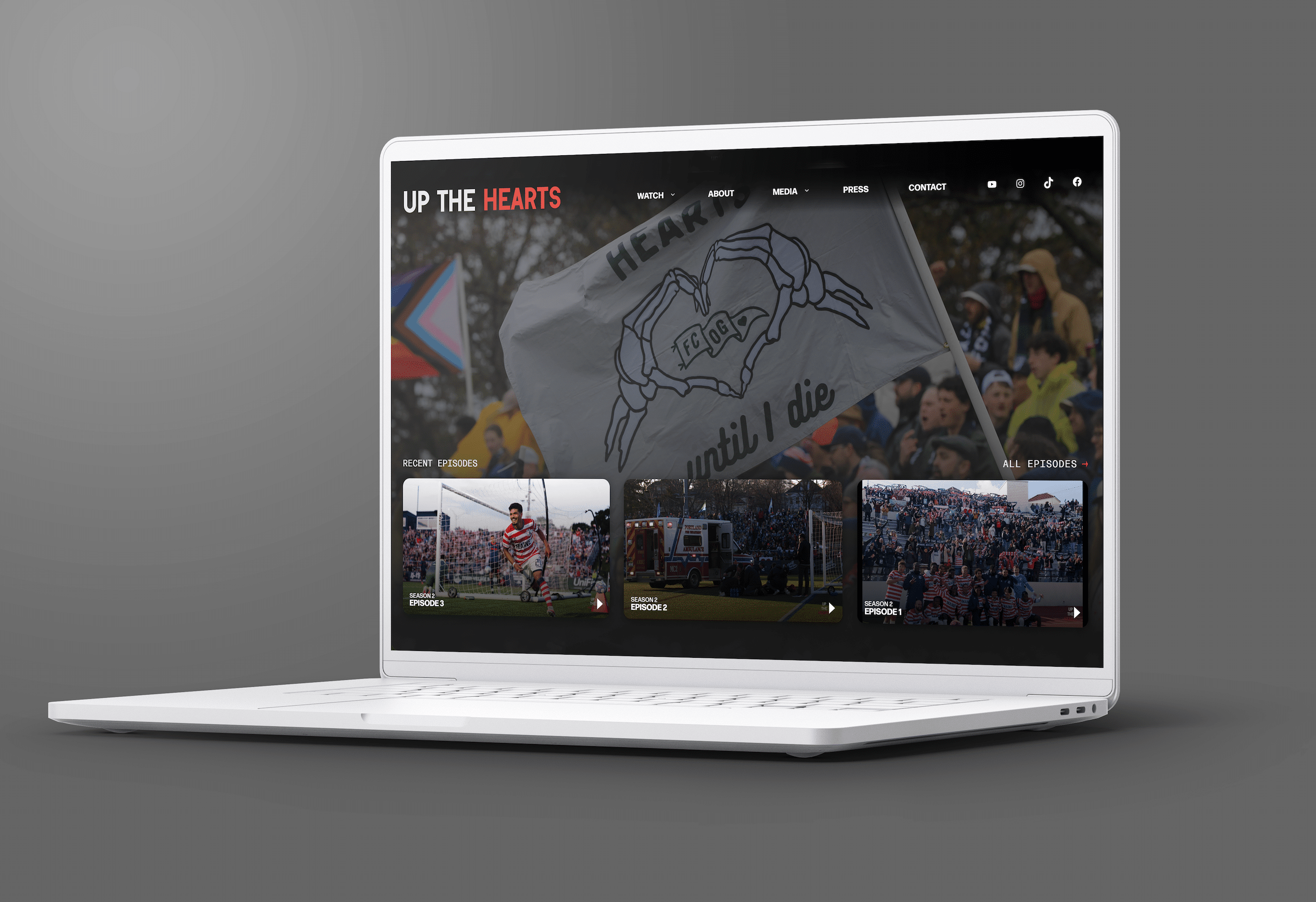 Website homepage for Up the Hearts with recent episode thumbnails and navigation links